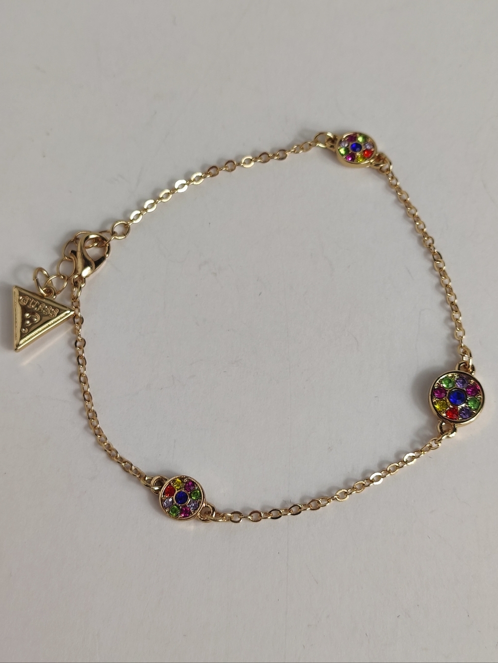 Guess Silver Tone Rainbow Crystal Bracelet Multicolor Rhinestone Charm Logo